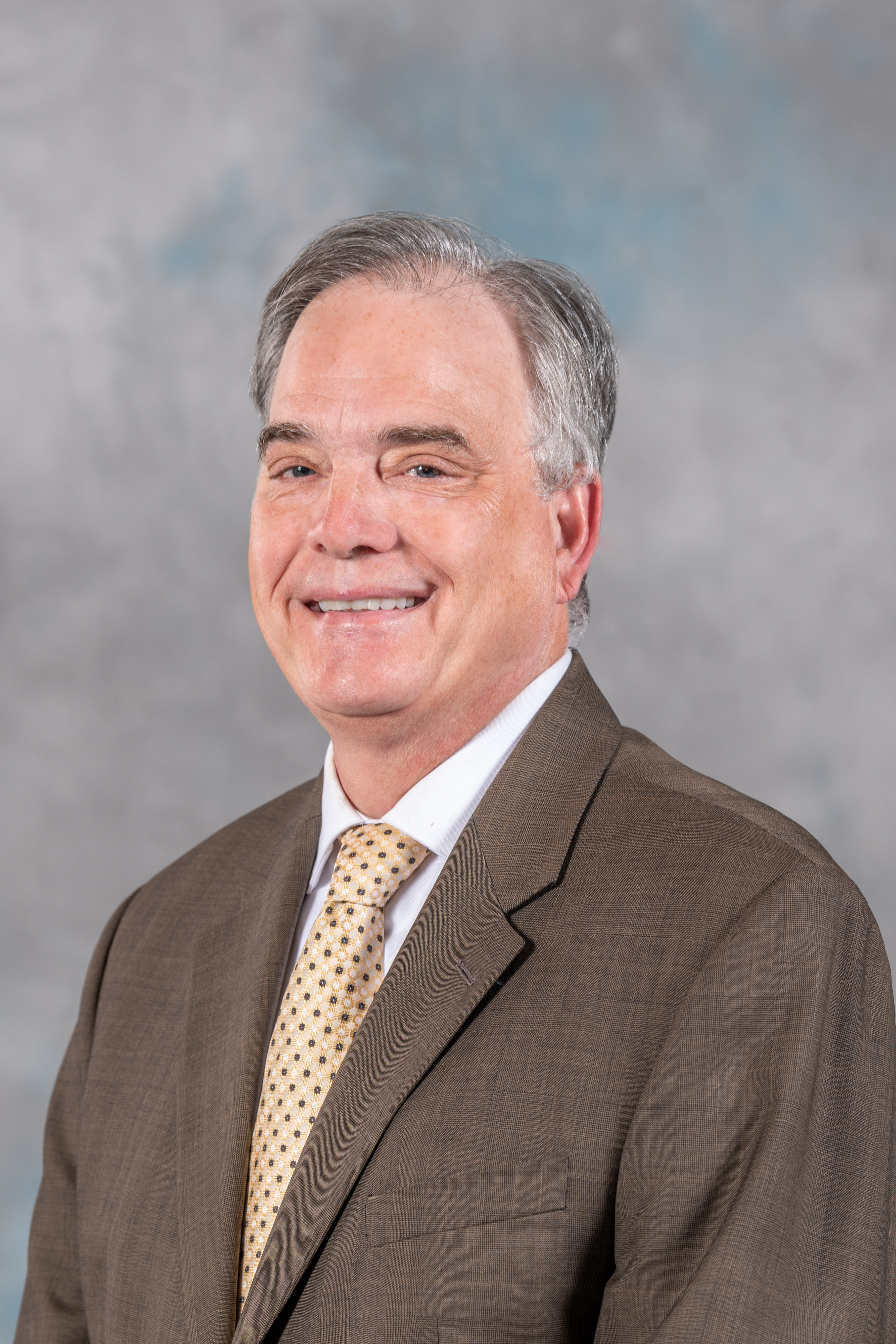 Trustee Darin Gharat